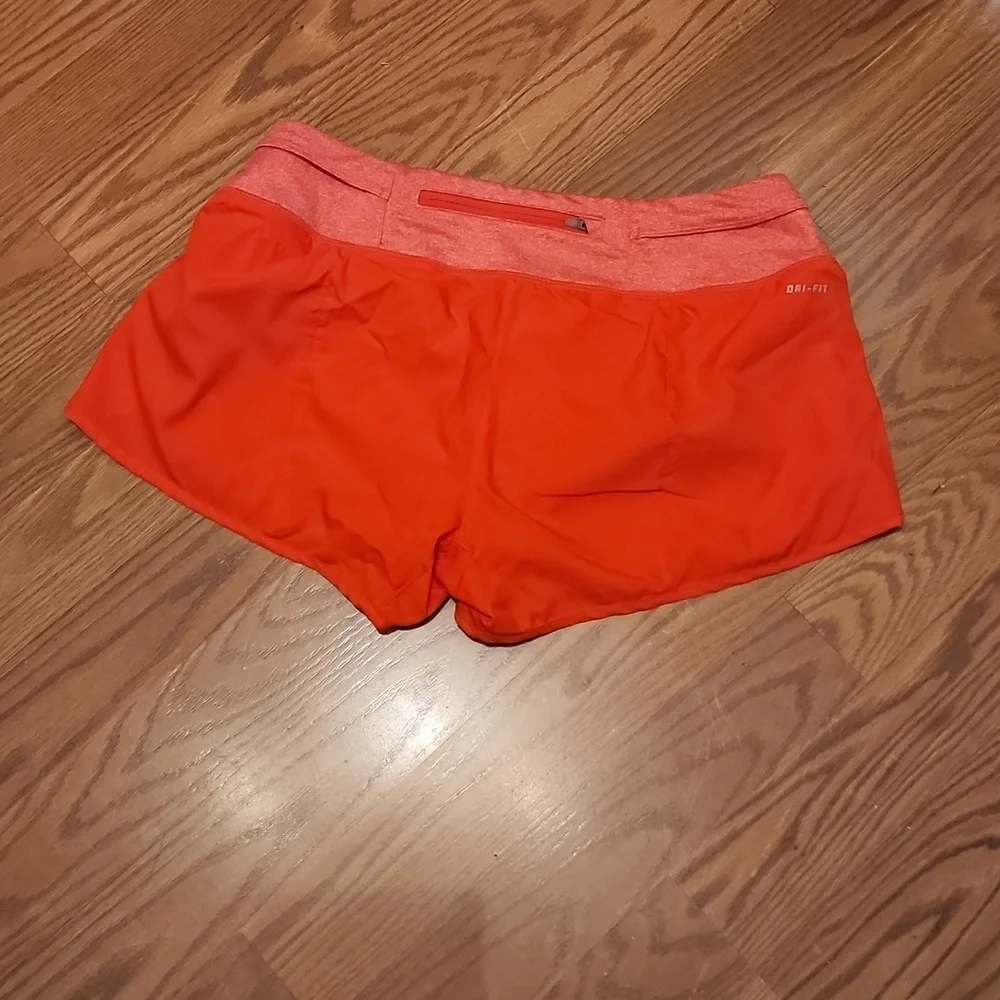 Nike running shorts med‎